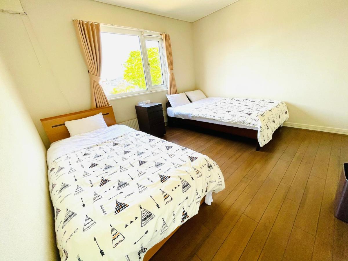 Chitose Guest House Oukaen Esterno foto