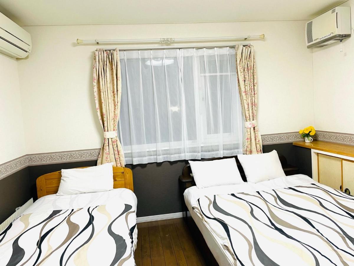 Chitose Guest House Oukaen Esterno foto
